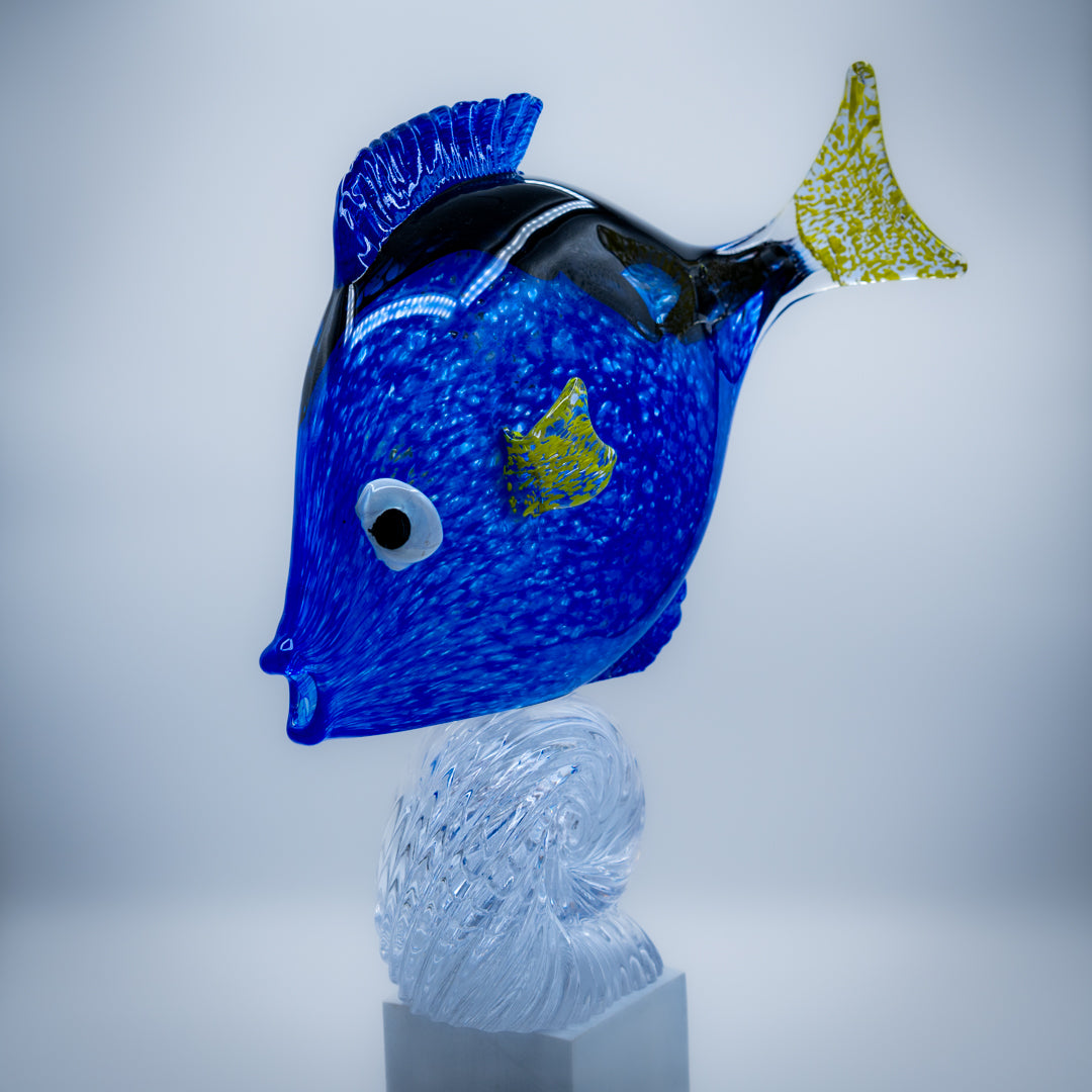 Regal Blue Tang Fish riding a wave